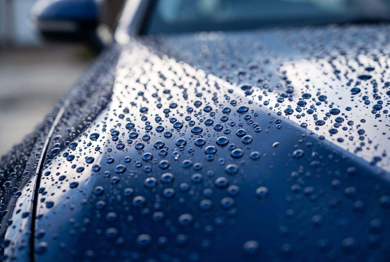 Water beading on a ceramic-coated car hood