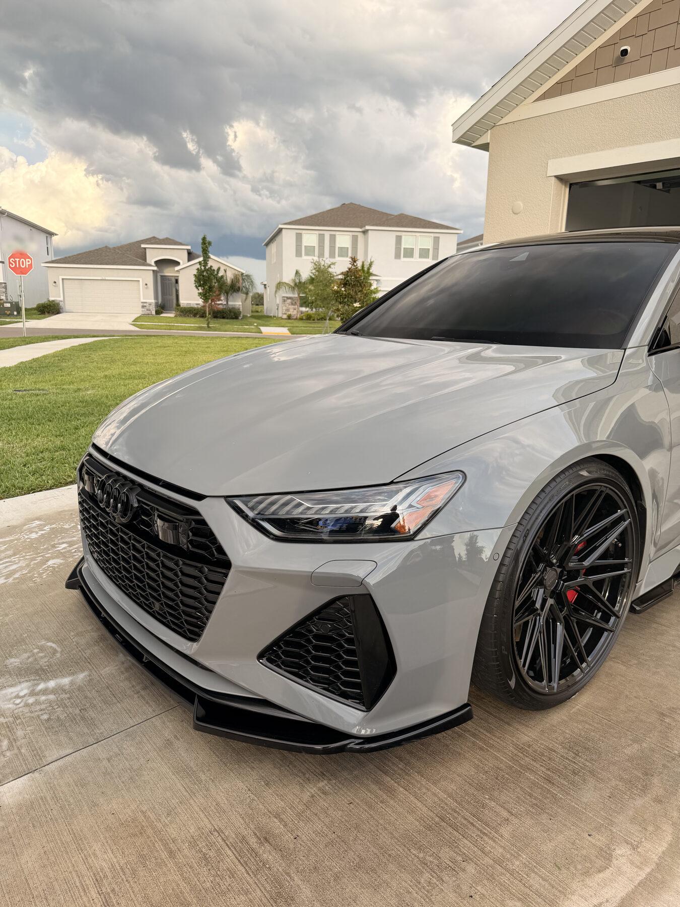 Finished Audi RS7 in Nardo grey on a residential driveway in the Tampa Bay area after a Luxury inside and out detail